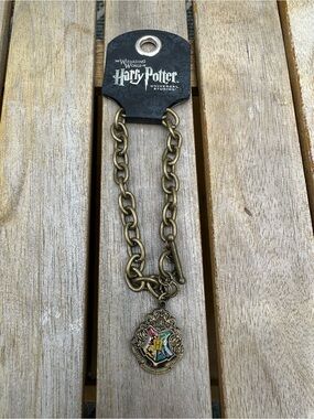 Harry Potter Gold-Tone Hogwarts Crest Pendant Bracelet